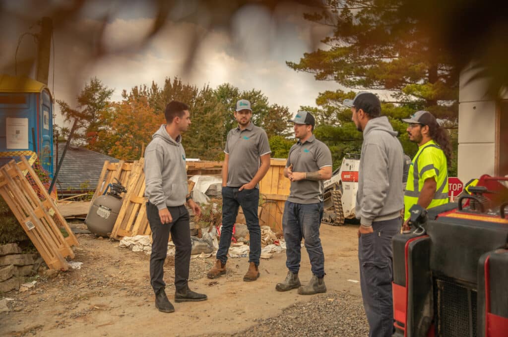 landscaping professionals talking with each other at landscaping jobs